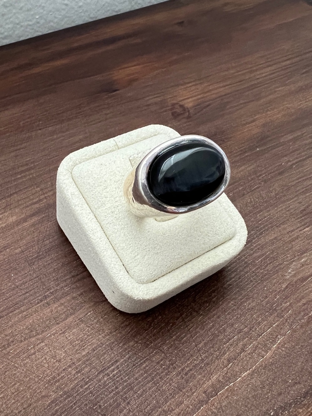 Oval silver and black ring